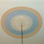 The ornate medallion received some touch ups and a fresh coat of paint.