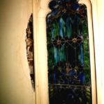 The interior plaster was applied directly over the masonry in this stone church.